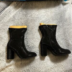 Torrid Black Heeled Boots with Gold Accent